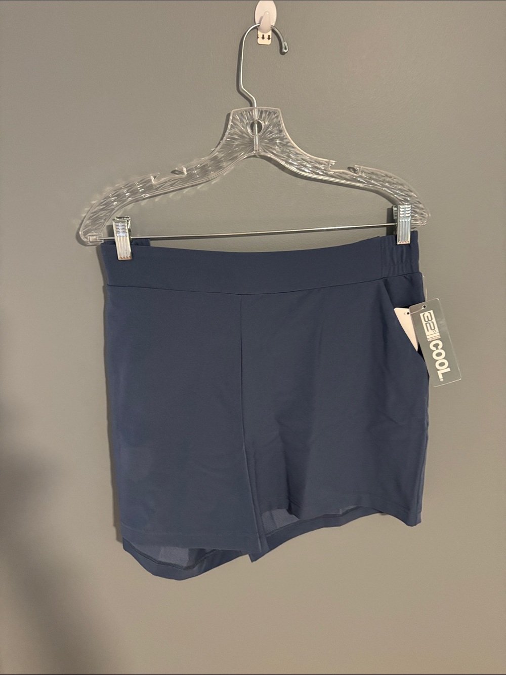 32 Degrees Navy Women’s Athletic Shorts with flattering flat front.